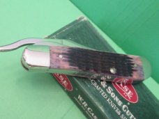 Case XX 2002 Purple Bone RussLock Pattern # 61953L SS