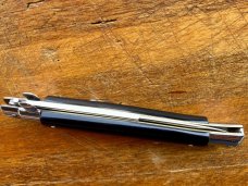 11 In. Italian Swivel Bolster,  Black Composition, Stainless Bayonet, SwitchBlade