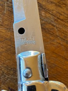 11 In. Italian Swivel Bolster,  Black Composition, Stainless Bayonet, SwitchBlade
