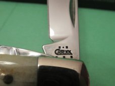 Case XX 2004 Honey Brown Bone, USA Shield, Saddle horn Pattern # T.B .62110  SS 
