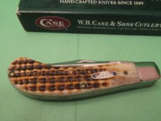 Case XX 2004 Honey Brown Bone, USA Shield, Saddle horn Pattern # T.B .62110  SS 
