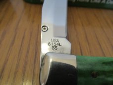 Case XX 2010 Green Bone John Deere Trapperlock Pattern # 6154L SS