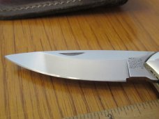 Buck 1997 Limited Edition Jigged Bone Sawby Lock Model 532 