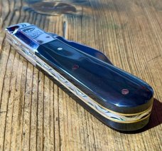 Taylor's Eye Witness Premium Barlow Clip with Buffalo Horn Scales and custom Back Spring Filing