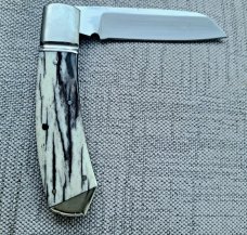 Robbie Ferreira Giraffe Bone Slipjoint...N690..4" closed..fluted bolsters with caps.slip