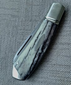 Robbie Ferreira Giraffe Bone Slipjoint...N690..4" closed..fluted bolsters with caps.slip