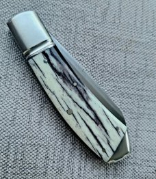 Robbie Ferreira Giraffe Bone Slipjoint...N690..4" closed..fluted bolsters with caps.slip