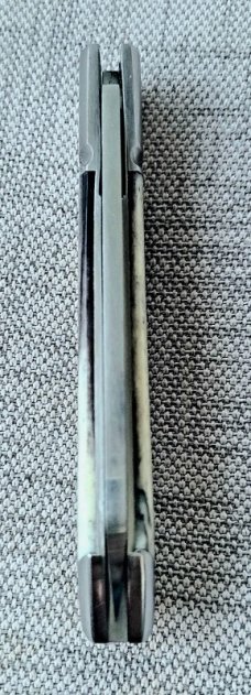 Robbie Ferreira Giraffe Bone Slipjoint...N690..4" closed..fluted bolsters with caps.slip