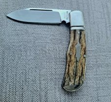 Robbie Ferreira Giraffe Bone Slipjoint...N690..3.75 clsd..fluted bolsters with caps.slip