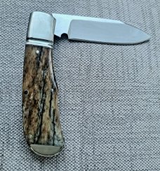 Robbie Ferreira Giraffe Bone Slipjoint...N690..3.75 clsd..fluted bolsters with caps.slip