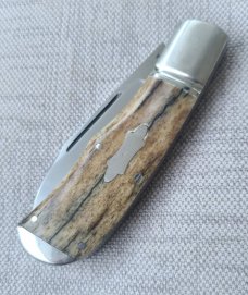 Robbie Ferreira Giraffe Bone Slipjoint...N690..3.75 clsd..fluted bolsters with caps.slip