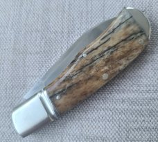 Robbie Ferreira Giraffe Bone Slipjoint...N690..3.75 clsd..fluted bolsters with caps.slip