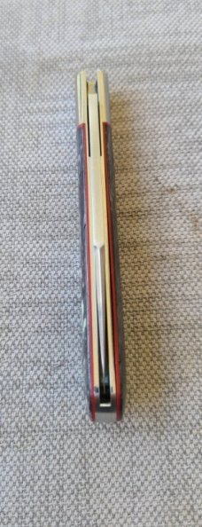 K'roo Black Kudu Bone Zulu...N690..3.75 closed..bolsters and shield..coa and slip 