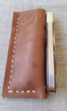 K'roo Black Kudu Bone Zulu...N690..3.75 closed..bolsters and shield..coa and slip 