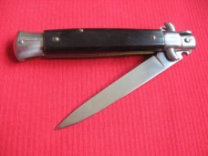 Older "INOX" Italian 9" Dark Horn Switchblade Knife.