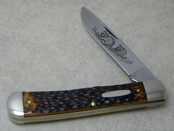 Western USA S-693 D Jigged Delrin Linerlock 1 Blade Trapper Knife with Raccoon Etch c.1980
