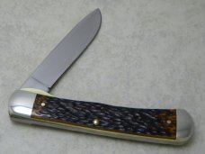 Western USA S-693 D Jigged Delrin Linerlock 1 Blade Trapper Knife with Raccoon Etch c.1980