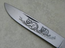Western USA S-693 D Jigged Delrin Linerlock 1 Blade Trapper Knife with Raccoon Etch c.1980