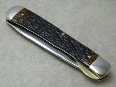 Western USA S-693 D Jigged Delrin Linerlock 1 Blade Trapper Knife with Raccoon Etch c.1980