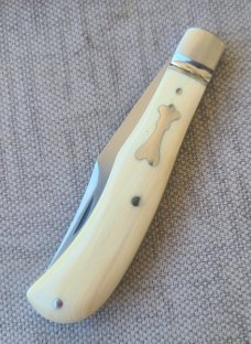 DrT Ivory Slimline Trapper...Cpm154...3 5/8 closed...coa and pouch..older build priced accordingly 