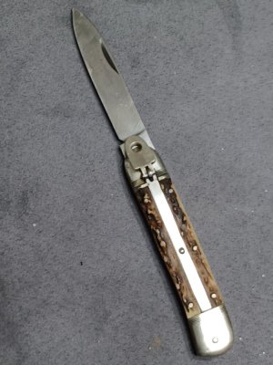 8" Vintage Hubertus Lever lock knife.