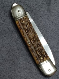 8" Vintage Hubertus Lever lock knife.