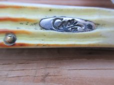 Case XX Copperhead in second cut burnt natural bone