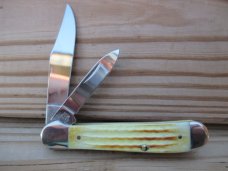 Case XX Copperhead in second cut burnt natural bone