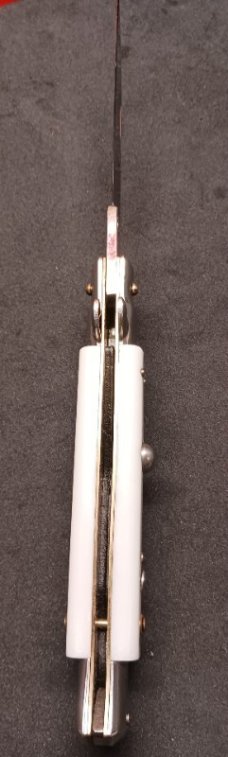 1980's edge co Model 120 White Pearlex Drop Point 9" w/ instruction leaflet