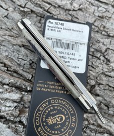 CASE XX ** 2023 AMERICAN FLAG NATURAL SMOOTH BONE RUSSLOCK