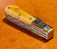Taylor's Eye Custom Twin Blade Barlow-Clip & Pen blades and Rams Horn scales and back spring filing
