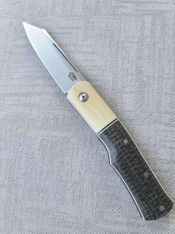 Johan Ellis Native..G10 & titanium liners..Rwl34 ..4"...Ivory G10 bolsters. Russian micarta scales
