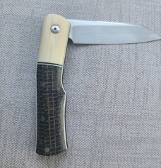 Johan Ellis Native..G10 & titanium liners..Rwl34 ..4"...Ivory G10 bolsters. Russian micarta scales