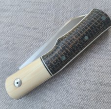 Johan Ellis Native..G10 & titanium liners..Rwl34 ..4"...Ivory G10 bolsters. Russian micarta scales