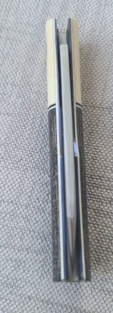 Johan Ellis Native..G10 & titanium liners..Rwl34 ..4"...Ivory G10 bolsters. Russian micarta scales
