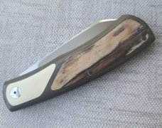 Johan Ellis Native 4".Raffir inlays.Paper Micarta Bolsters..Canvas Frame. G10 & titanium liners.