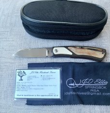 Johan Ellis Native 4".Raffir inlays.Paper Micarta Bolsters..Canvas Frame. G10 & titanium liners.