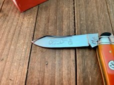Colonel Coon by Queen Humpback Whittler Smooth Orange Bone