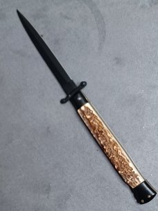 11" Stag scales Italian Stiletto swinguard. Frank Beltrame Dagger Teflon coated blade. Flat button. 