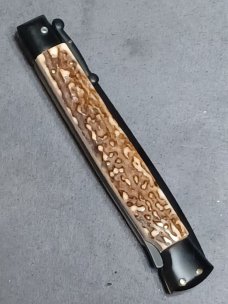 11" Stag scales Italian Stiletto swinguard. Frank Beltrame Dagger Teflon coated blade. Flat button. 