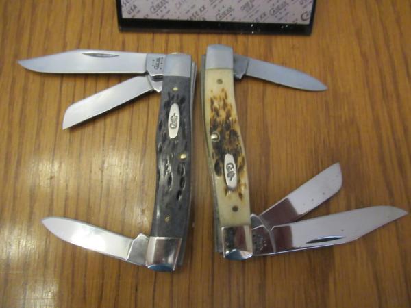 Case XX 2002 One is a Black Bone Stockman the other is Brown ,EDC Pattern#63032 2 for the money Case XX 2002 One is a Black Bone Stockman the other is Brown ,EDC Pattern#63032 2 for the money