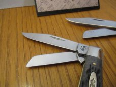 Case XX 2002 One is a Black Bone Stockman the other is Brown ,EDC Pattern#63032 2 for the money