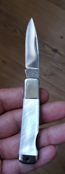 A. G. Russell knives, 3 pc. Set of small lockbacks in Buffalo horn, premium stag, and genuine pearl