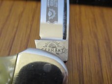 German Eye $ Eye Baby Canoe Pearlite Handles 