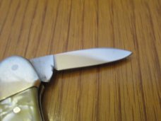 German Eye $ Eye Baby Canoe Pearlite Handles 