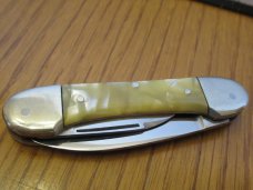 German Eye $ Eye Baby Canoe Pearlite Handles 