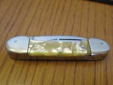 German Eye $ Eye Baby Canoe Pearlite Handles 