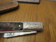 Colonial Rough Saw Cut Delrin Handle Master Barlow 
