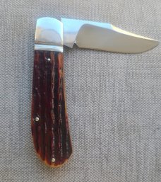 David R. Davis Amber Sambar Stag Lanny...4.1625" Ats34 steel..fluted...vine filework..coa and pouch 