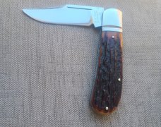 David R. Davis Amber Sambar Stag Lanny...4.1625" Ats34 steel..fluted...vine filework..coa and pouch 